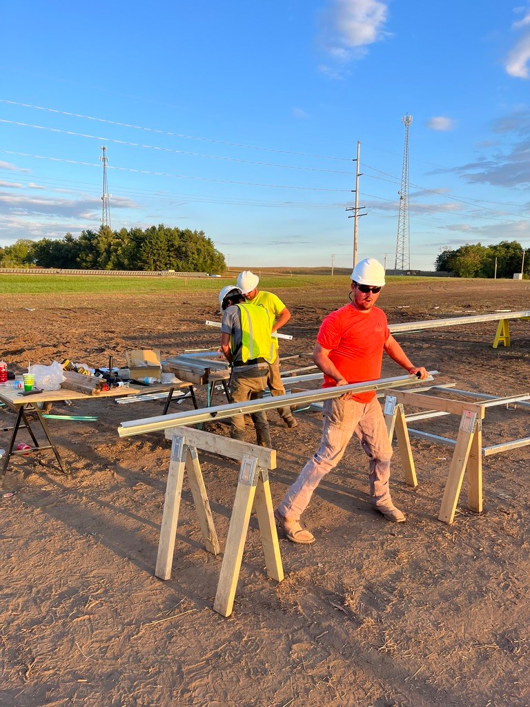Crew preparing racking materials at Havana CDCS