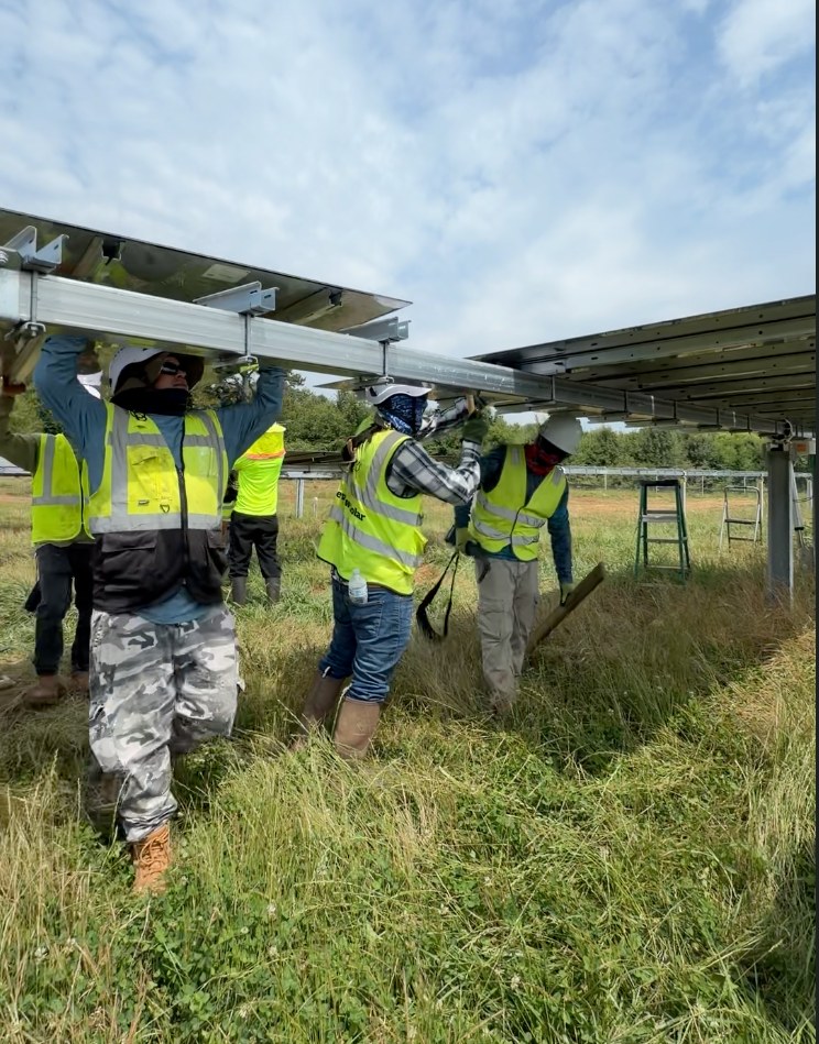 Crew installing solar modules at Jackson Bernal