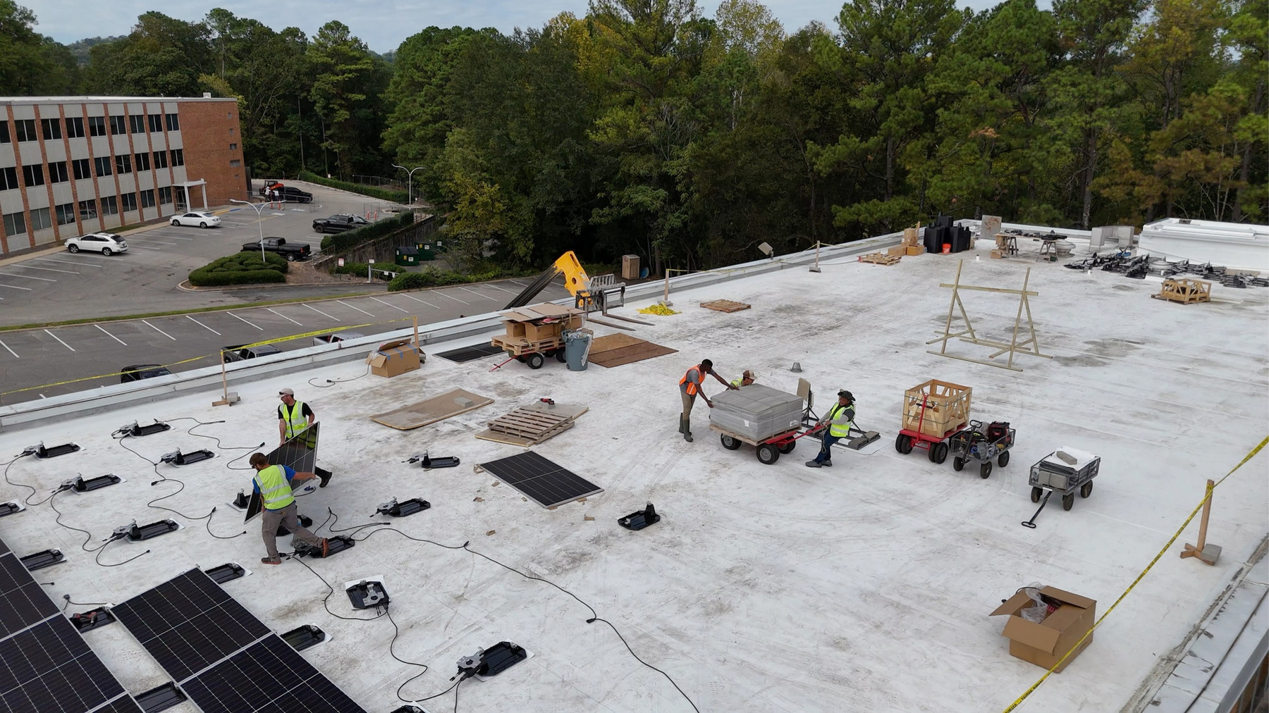 Aerial view of rooftop installation work at Ladd Office Park