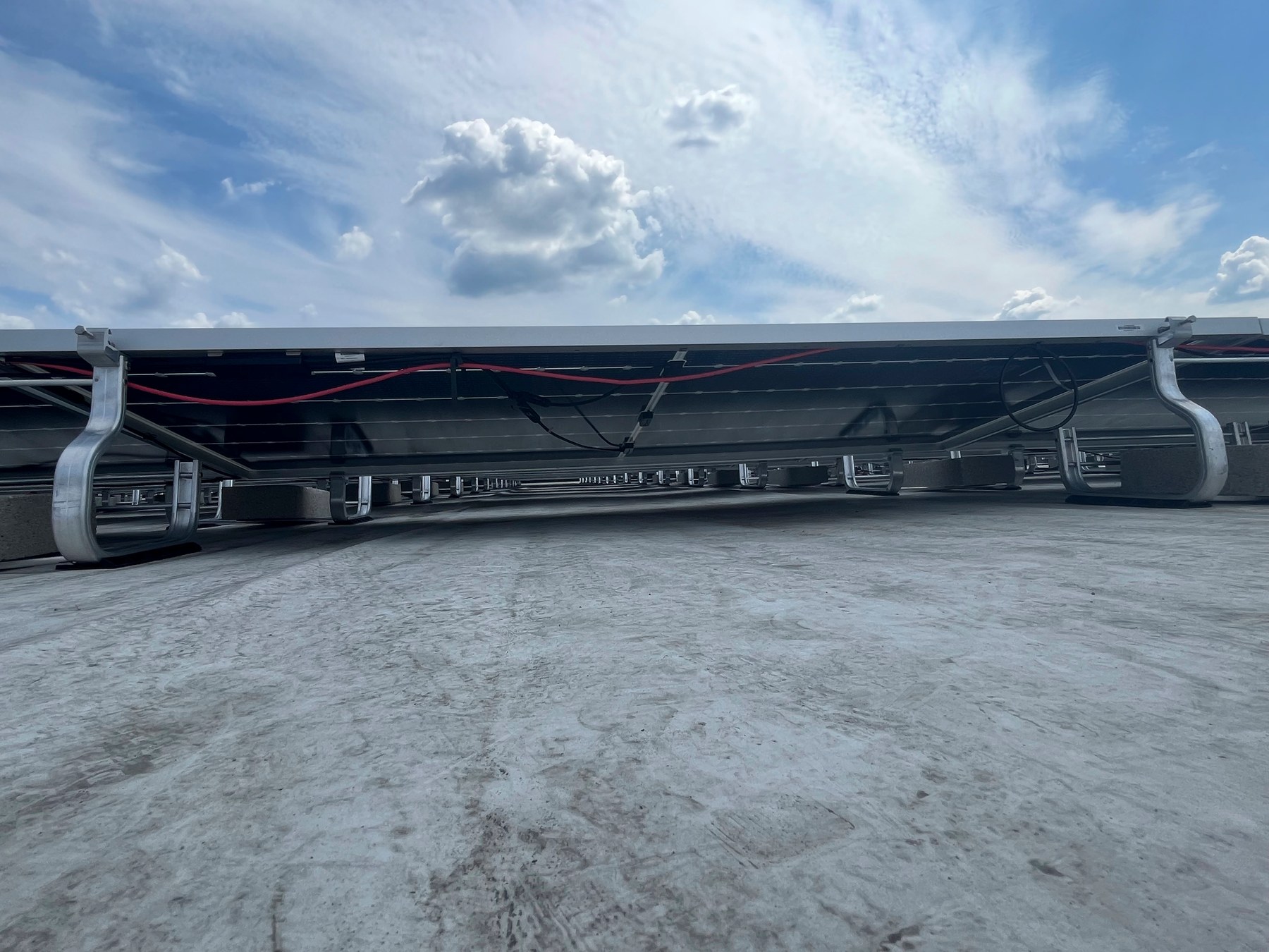 Close view of rooftop solar racking and wiring at Mitchell Beverage