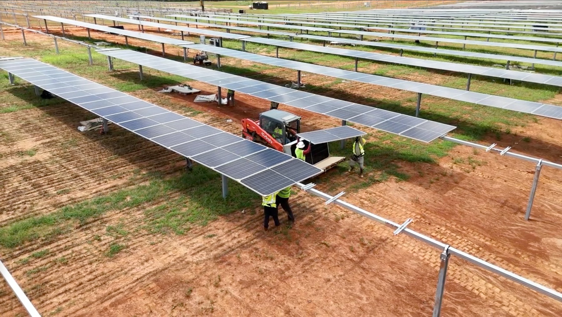 Crew installing solar modules at Murray Treadwell